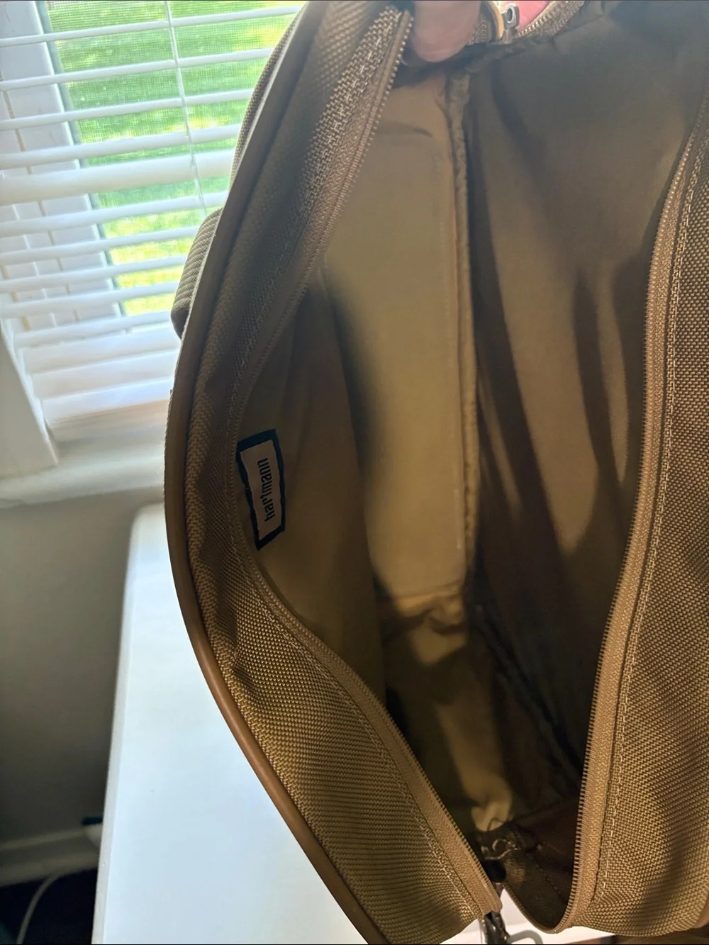 Hartmann nylon and leather  travel case with trolley sleeve.